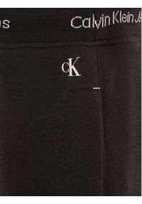 Calvin Klein Jeans Spodnie dresowe Intrasia IB0IB01815 Czarny Regular Fit. Kolor: czarny. Materiał: bawełna #3