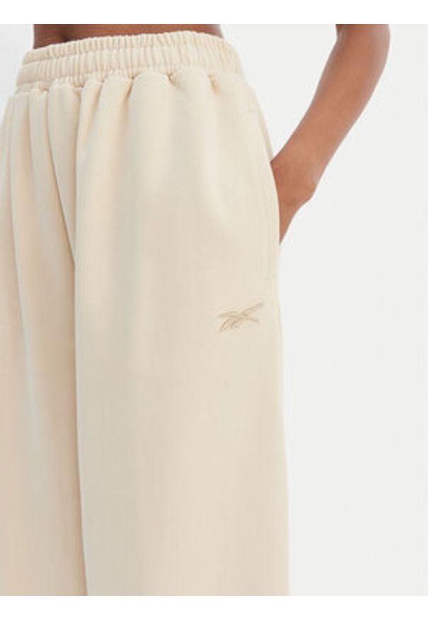 Reebok Spodnie dresowe Reebok x Ewa Chodakowska RK25624CCW Beżowy Wide Leg. Kolor: beżowy. Materiał: syntetyk