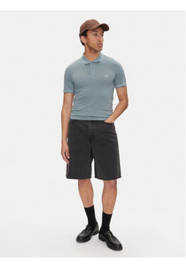 Calvin Klein Jeans Polo J30J315603 Niebieski Slim Fit. Typ kołnierza: polo. Kolor: niebieski. Materiał: bawełna