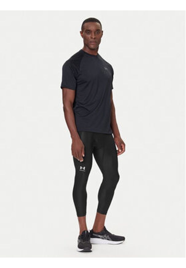 Under Armour Legginsy HeatGear® 1361588 Czarny Slim Fit. Kolor: czarny. Materiał: syntetyk