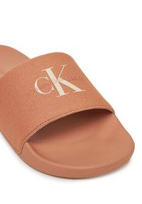 Calvin Klein Jeans Klapki Slide Monogram Wn YW0YW01835 Koralowy. Kolor: pomarańczowy. Materiał: materiał #6