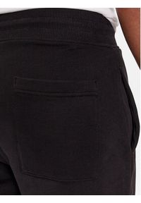 Tommy Jeans Spodnie dresowe Entry DM0DM18935 Czarny Slim Fit. Kolor: czarny. Materiał: bawełna