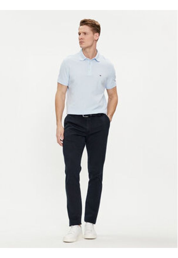 TOMMY HILFIGER - Tommy Hilfiger Chinosy Bleecker MW0MW33910 Granatowy Slim Fit. Kolor: niebieski. Materiał: bawełna