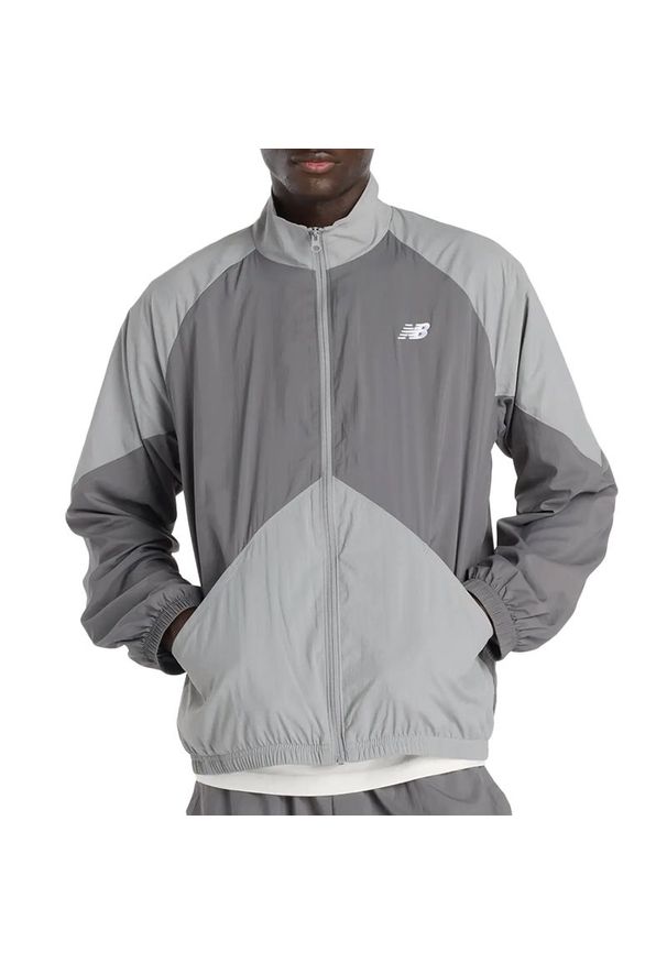 Kurtka męska New Balance MJ61J73YCAS - szara. Typ kołnierza: kołnierzyk stójkowy. Kolor: szary. Materiał: materiał, poliester. Sezon: jesień, wiosna