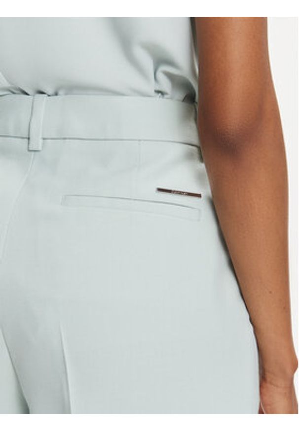 Calvin Klein Chinosy K20K205959 Zielony Slim Fit. Kolor: zielony. Materiał: wiskoza, syntetyk