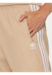 Adidas - adidas Spodnie dresowe adicolor Classics Beckenbauer IZ1857 Beżowy Slim Fit. Kolor: beżowy. Materiał: bawełna #4