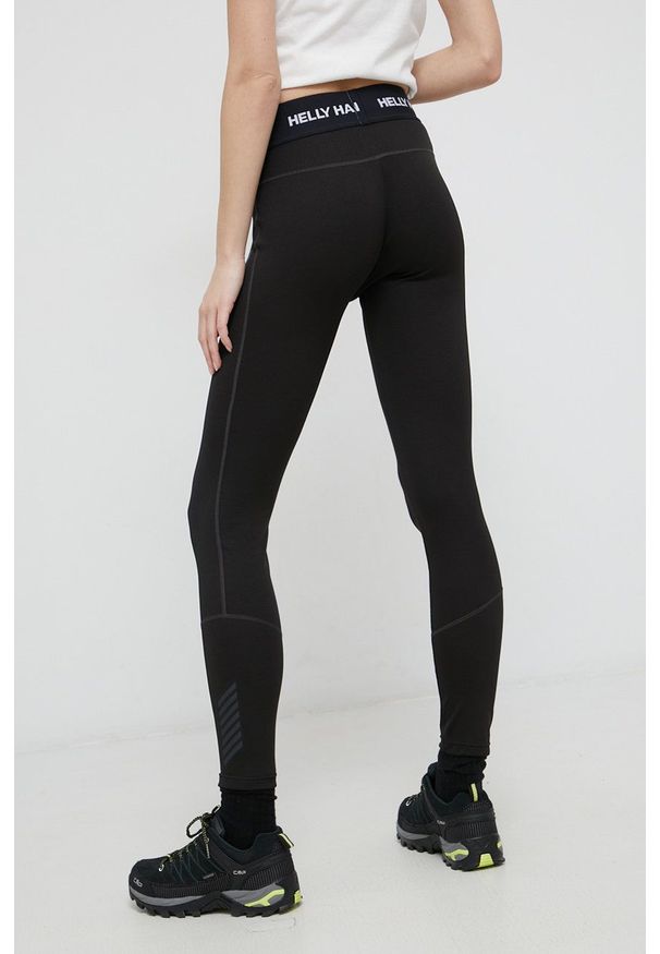 Helly Hansen Legginsy damskie kolor czarny gładkie. Kolor: czarny. Materiał: dzianina. Wzór: gładki