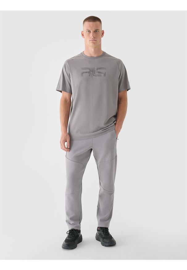 4f - 4F Spodnie dresowe męskie 4F x Robert Lewandowski - szare XXL. Kolor: szary. Materiał: dresówka. Wzór: gładki, nadruk, ze splotem
