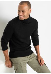 bonprix - Ciepły sweter z golfem, ze ściągaczem. Typ kołnierza: golf. Kolor: czarny. Materiał: prążkowany. Wzór: prążki #1