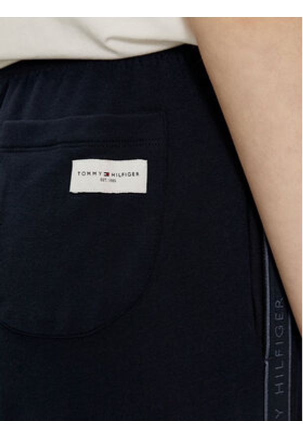 TOMMY HILFIGER - Tommy Hilfiger Spodnie dresowe UW0UW04771 Granatowy Relaxed Fit. Kolor: niebieski. Materiał: dresówka