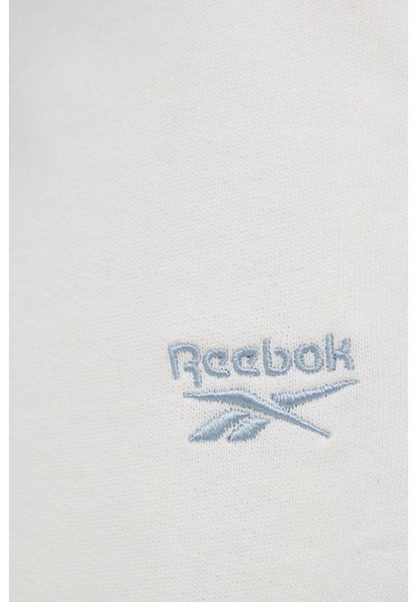 Reebok Classic Spodnie bawełniane damskie kolor kremowy gładkie. Stan: podwyższony. Kolor: beżowy. Materiał: bawełna. Wzór: gładki