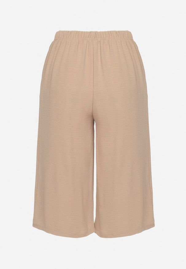 Born2be - Beżowe Szerokie Spodnie z Gumką w Pasie 3/4 z Kieszonkami Efronessa. Okazja: na spotkanie biznesowe, na co dzień. Kolor: beżowy. Styl: casual, klasyczny, biznesowy