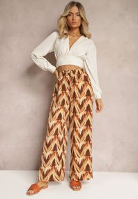 Renee - Beżowo-Brązowe Szerokie Spodnie z Gumką i Wiązaniem w Talii Vayolet. Okazja: na co dzień. Kolor: beżowy. Materiał: tkanina. Styl: casual #3