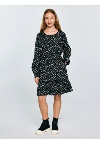 Big-Star - Sukienka dziewczęca z wiskozy z motywem kwiatowym czarna Namisa 906. Kolor: czarny. Materiał: wiskoza. Długość rękawa: długi rękaw. Wzór: kwiaty. Typ sukienki: rozkloszowane