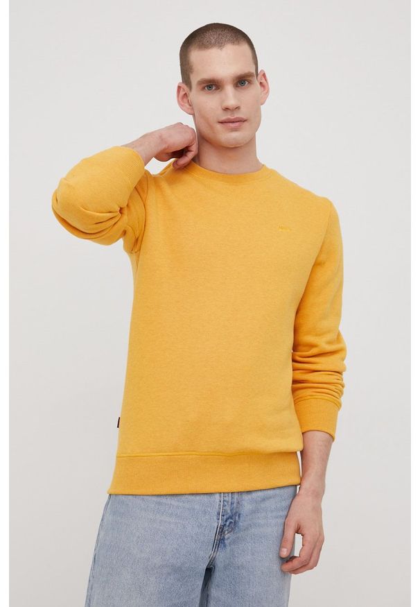 Superdry bluza męska kolor żółty gładka. Okazja: na co dzień. Kolor: żółty. Materiał: bawełna. Wzór: gładki. Styl: casual