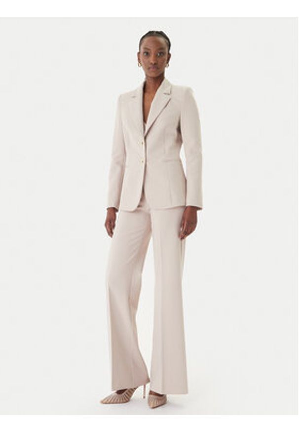 Rinascimento Spodnie palazzo CFC0127878003 Beżowy Wide Leg. Kolor: beżowy. Materiał: syntetyk
