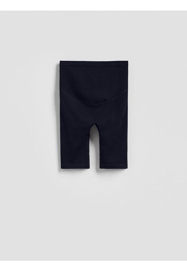 Reserved - Prążkowane kolarki - granatowy. Kolor: niebieski. Materiał: prążkowany
