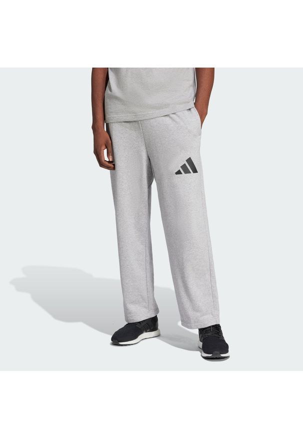 Adidas - Spodnie Essentials Wide Leg 3 Bar Logo. Kolor: czarny, szary, wielokolorowy. Materiał: materiał. Sport: fitness