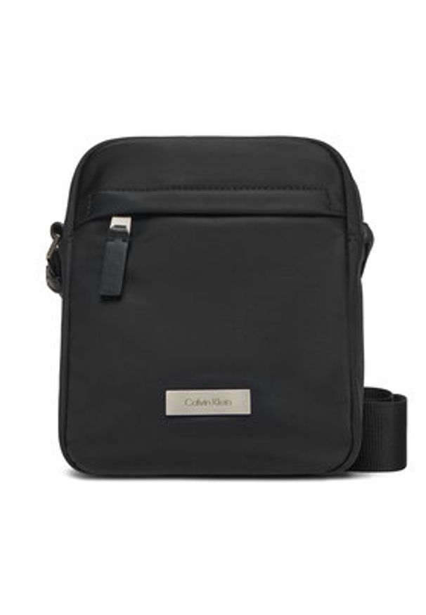 Calvin Klein Saszetka Sleek Reporter LV04D3180G Czarny. Kolor: czarny. Materiał: materiał