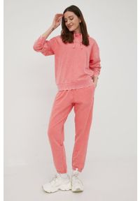 Champion spodnie dresowe 114943 damskie kolor różowy z aplikacją. Stan: podwyższony. Kolor: różowy. Materiał: dresówka. Wzór: aplikacja #2