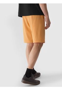 4f - 4F Spodenki dresowe męskie - pomarańczowe 3XL. Okazja: na co dzień. Kolor: pomarańczowy. Materiał: dresówka. Długość: krótkie. Wzór: gładki, ze splotem. Styl: sportowy, casual