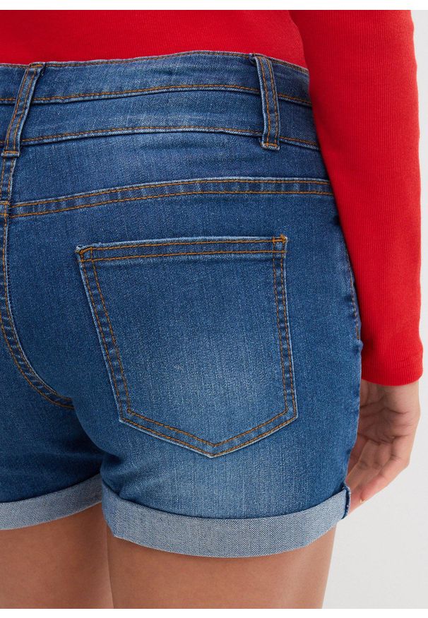bonprix - Szorty dżinsowe mid waist. Kolor: niebieski. Długość: krótkie