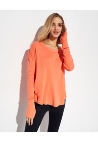 FREE PEOPLE - Pomarańczowa bluzka Colby. Kolor: pomarańczowy. Materiał: bawełna. Długość: długie