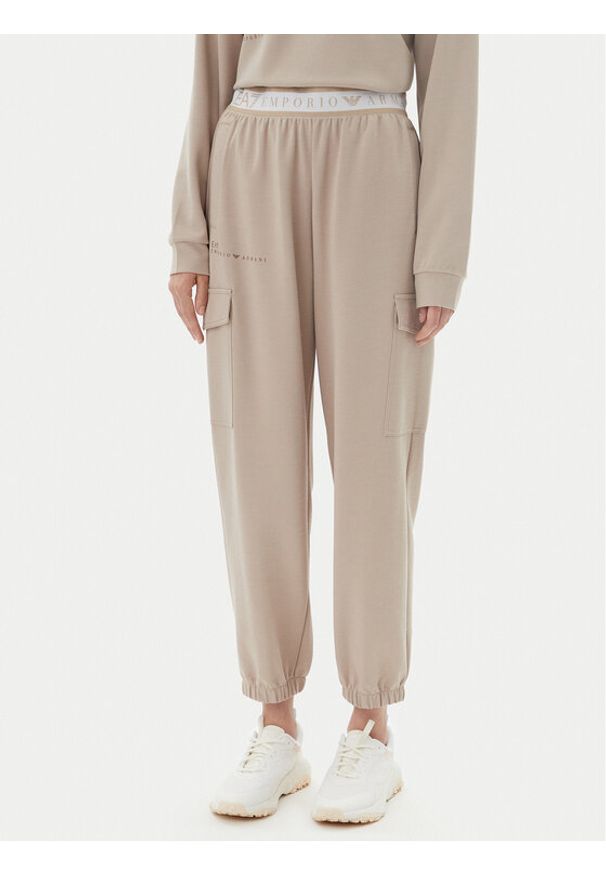EA7 Emporio Armani Spodnie dresowe 7W000282 AF12501 U6155 Beżowy Loose Fit. Kolor: beżowy. Materiał: syntetyk