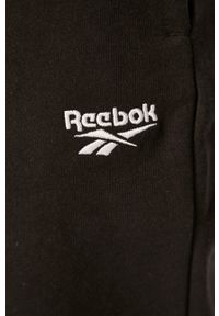 Reebok Classic - Spodnie. Kolor: czarny. Materiał: bawełna, materiał, dzianina, elastan. Wzór: gładki #4