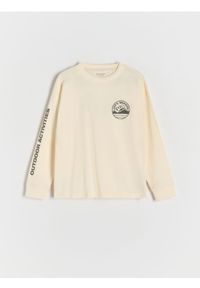 Reserved - Longsleeve z nadrukiem - złamana biel. Materiał: dzianina, bawełna. Długość rękawa: długi rękaw. Wzór: nadruk