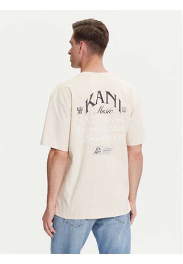 Karl Kani T-Shirt PD00005333 Beżowy Relaxed Fit. Kolor: beżowy. Materiał: bawełna