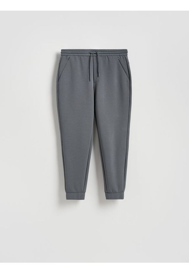 Reserved - Spodnie dresowe slim fit - szary. Kolor: szary. Materiał: dresówka