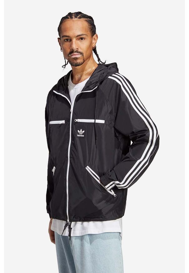 adidas Originals kurtka Adicolor Classics Windbreaker męska kolor czarny przejściowa oversize HS2066-CZARNY. Kolor: czarny. Materiał: materiał. Długość rękawa: raglanowy rękaw