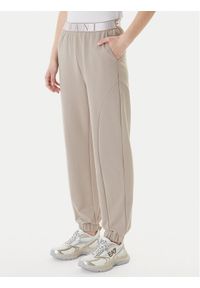 EA7 Emporio Armani Spodnie dresowe 7W001154 AF12501 U6225 Beżowy Regular Fit. Kolor: beżowy. Materiał: syntetyk #1