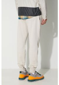 columbia - Columbia spodnie dresowe męskie kolor beżowy gładkie. Kolor: beżowy. Materiał: dresówka. Wzór: gładki #5