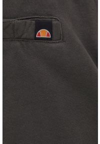 Ellesse spodnie dresowe bawełniane męskie kolor szary z aplikacją. Kolor: szary. Materiał: bawełna, dresówka. Wzór: aplikacja
