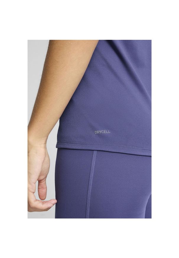 Puma - Damska koszulka bez rękawów TAD ESSENTIALS o kroju bokserki PUMA Blue Crystal. Kolor: niebieski, wielokolorowy, czarny. Długość rękawa: bez rękawów. Sport: bieganie