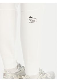 Lacoste Spodnie dresowe XF0343 Biały Regular Fit. Kolor: biały. Materiał: bawełna
