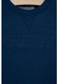 Guess Bluza dziecięca gładka. Okazja: na co dzień. Kolor: niebieski. Materiał: bawełna, poliester, dzianina. Długość rękawa: raglanowy rękaw. Wzór: gładki. Styl: casual #3