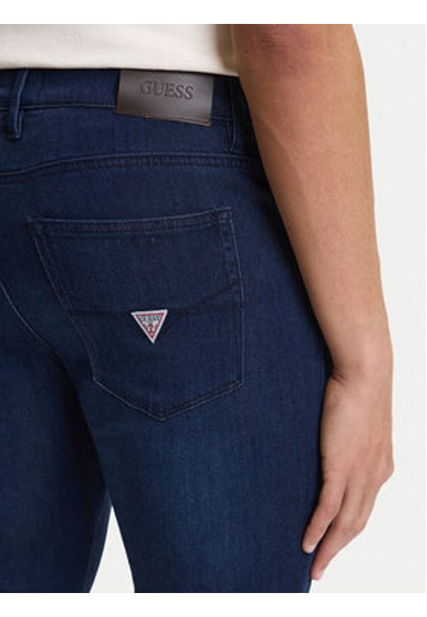 Guess Jeansy M6GAS2 D1086 Granatowy Slim Tapered Fit. Kolor: niebieski