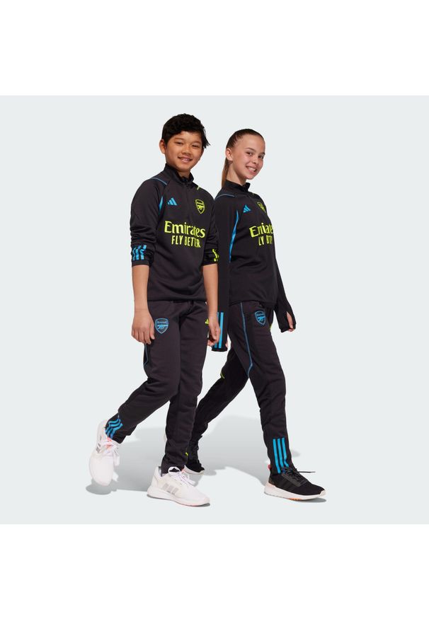 Spodnie do piłki nożnej dla dzieci Adidas Arsenal Tiro 23 Training. Kolor: czarny. Materiał: dresówka, materiał. Sport: fitness, piłka nożna