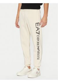 EA7 Emporio Armani Spodnie dresowe 8NPPB5 PJ07Z 1713 Beżowy Regular Fit. Kolor: beżowy. Materiał: bawełna