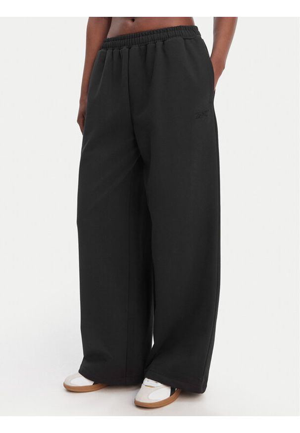 Reebok Spodnie dresowe Reebok x Ewa Chodakowska RK25624CCW Czarny Wide Leg. Kolor: czarny. Materiał: syntetyk
