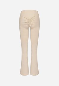 Born2be - Beżowe Legginsy Typu Dzwony z Wysokim Stanem Orralise. Okazja: na co dzień. Stan: podwyższony. Kolor: beżowy. Styl: casual