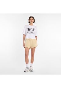Spodenki damskie New Balance WB61Y80AABC – żółte. Kolor: żółty. Materiał: dzianina, bawełna, poliester. Długość: krótkie. Wzór: napisy #3