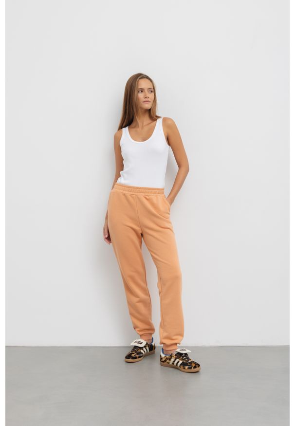 LEKKIE SPODNIE CELINE MANGO S - Flawless. Okazja: na co dzień. Materiał: skóra, dresówka, bawełna, elastan, guma. Styl: casual, klasyczny