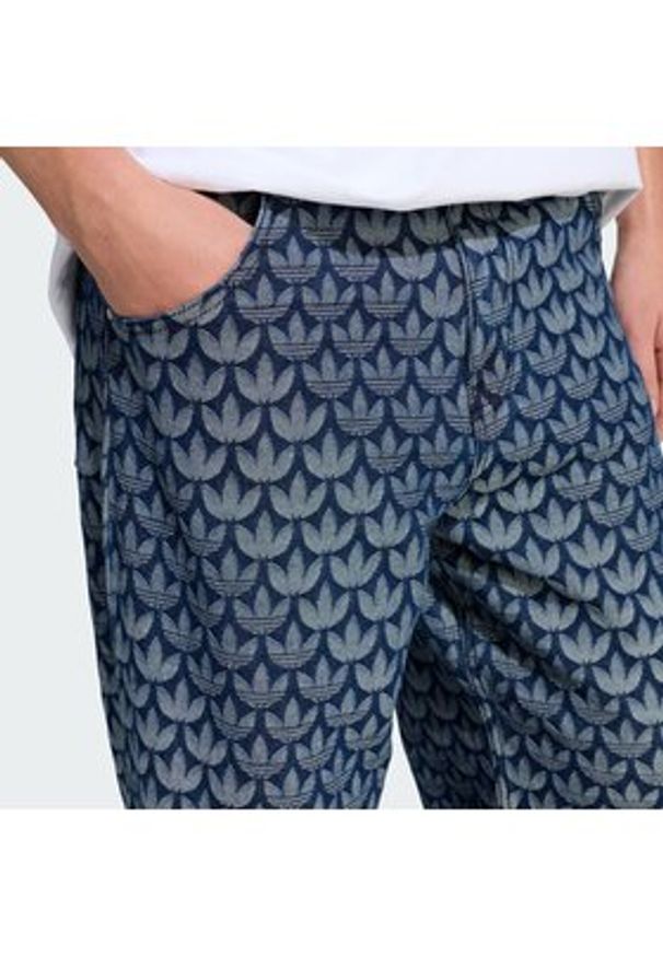 Adidas - adidas Jeansy Monogram KD0399 Niebieski Loose Fit. Kolor: niebieski