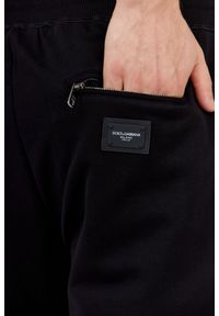 Dolce and Gabbana - DOLCE & GABBANA Czarne szorty męskie z bawełny, Rozmiar 54. Kolor: czarny. Materiał: poliester, bawełna. Wzór: aplikacja #4