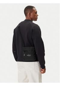 Calvin Klein Saszetka Bold Flatpack LV04D3178G Beżowy. Kolor: beżowy. Materiał: materiał