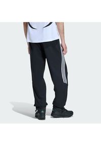 Adidas - adidas Spodnie dresowe adicolor Teamgeist KD5863 Czarny Loose Fit. Kolor: czarny. Materiał: syntetyk #4